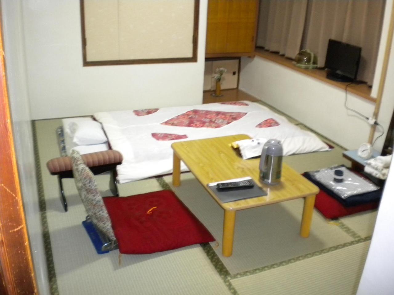 Отель Mimatsuso Ryokan Асахикава Экстерьер фото